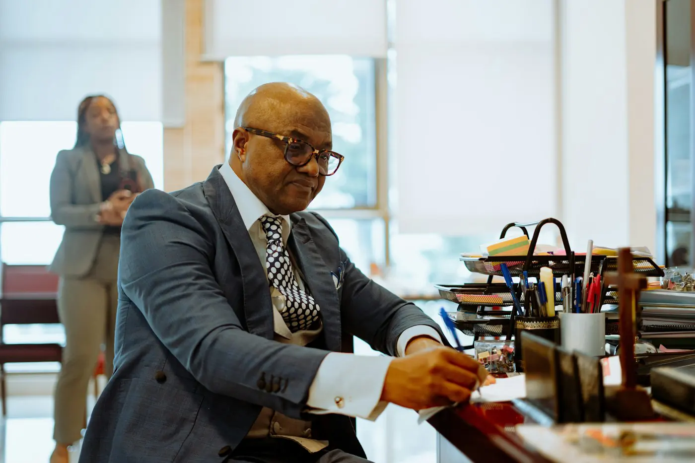 Senior accountant reviewing documents at his desk