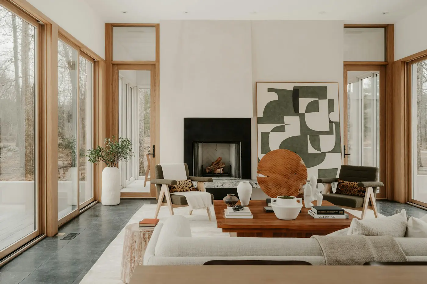 Bright living room with a fireplace and large windows