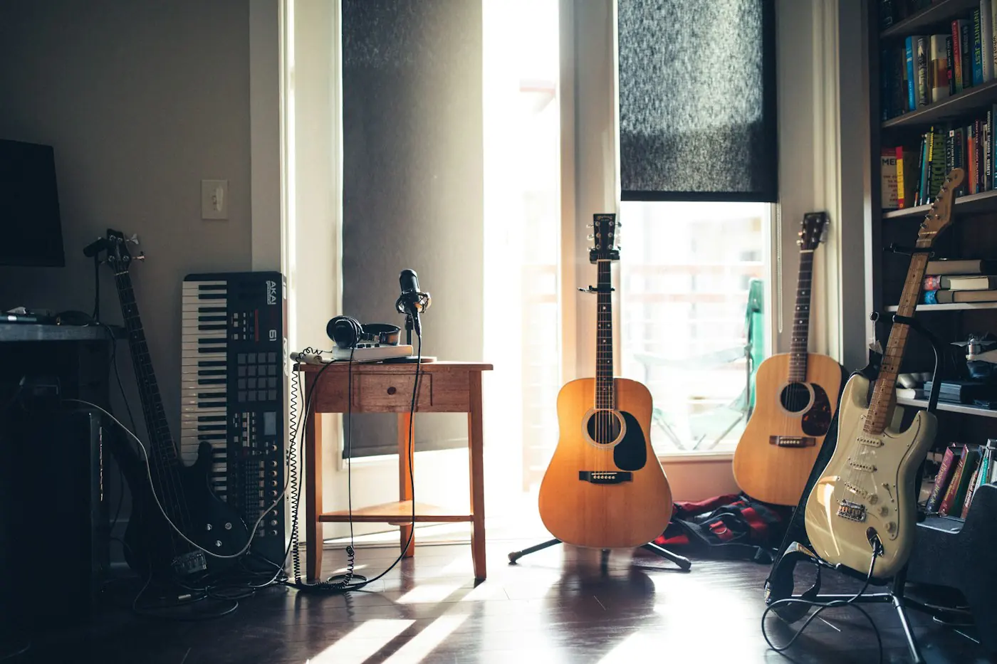Music room with guitars on stands and a keyboard